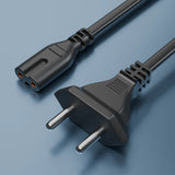 Two-pin universal power plug and matching female connector on blue background.